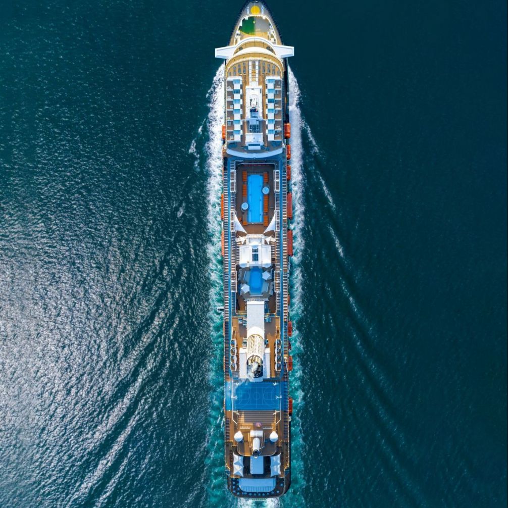 Cruise Liners beautiful white cruise ship above asphalt new year Cruise Liners beautiful white cruise ship above asphalt new year numbers 2024,luxury cruise in the ocean sea concept exclusive tourism travel on holiday.