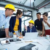Business executives discussing during meeting in office