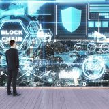 businessman-looking-at-abstract-glowing-business-i-2026-03-26-05-21-01-utc