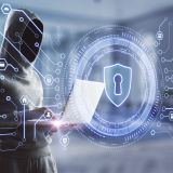 hacker-using-laptop-with-security-shield-visualiza-2026-03-26-05-03-00-utc