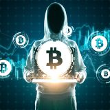 hacker-with-bitcoin-laptop-on-digital-background-2026-03-26-05-27-41-utc