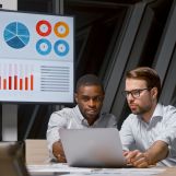 Young business colleagues discussing the financial strategy of a corporation at boardroom meeting SSUCv3H4sIAAAAAAAACnRSy47cIBC8R8o/WJzXim0YMHvcQ26Rco9yaKA9g5aBEeCNotX8e/BrQqLkRlcX1dWP948fmoYoSFaT5+Z9iUpsnZtTjpBt8AXunnY8ojcYa+QtUt7VABqbQ7TgalBB1hcPVyygn51b4PuaJClDnhOmqrqJCNeU7UrvK66GjOci/gf78P5ti5sjsSbLj5IiL3OyHlP69Nl68BrJU8VJs1o4XzHcHJIjsZX8j97O/YfKF/S/JbbH92MKcEavfy7W71VTER3CNoC9BcJPE2Wj0m3fIW0Z62grJzW0nE9C02niHXsUJ1wYxHFgraGKFbLUreymvtViBCVBMsbZamnzQV5/ZIzXdYK7A5iNDdVE34IGtxBoZfMWrbb+XH0L+bLewvFNh9nnuPRHHuZcCDdQZVTPzVQ08cAvkFKhmwOvl1wuL1yrOj7kdTq7KjHlCpawp4OUA+uEZKKnPe/FTthO6mKLzmrnMDjfXACDS9HHTv86Nn5igoueiy1f76mo6Vdr6sHZRYpIU5Yydl0rhSrbAjCtpFS1CJLzcThRgVAWcP8FAAD//wMAgoTE92sDAAA=